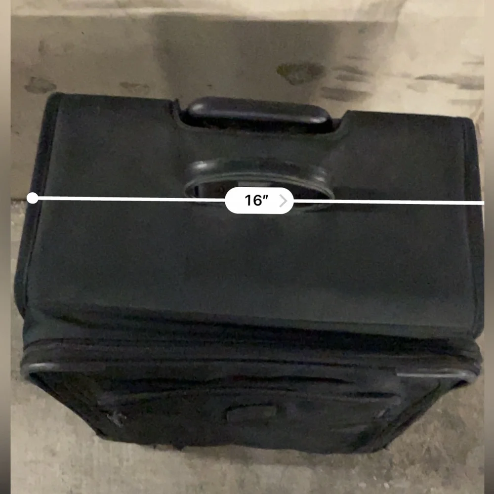TUMI Check On Suitcase
